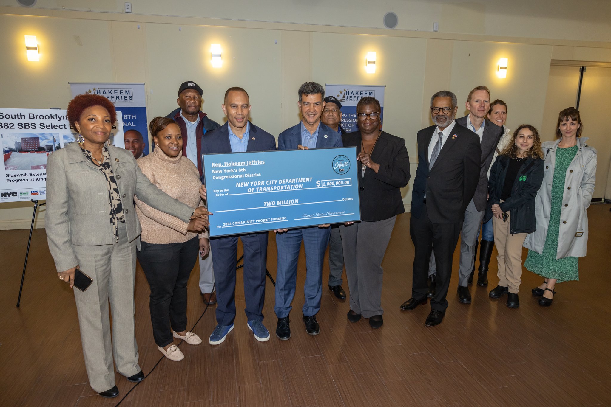 Congressman Hakeem Jeffries and NYC DOT Commissioner Ydanis Rodríguez accept a $2 million check in federal 2024 Community Project Fudning.