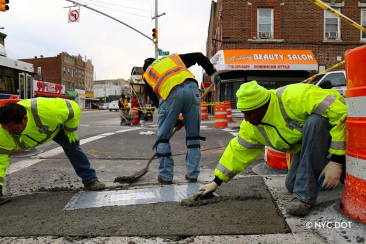 Crews reconstruct pedestrian ramps on Northern Blvd and 102 St