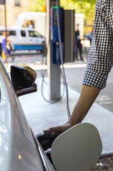 Electric vehicle being charged