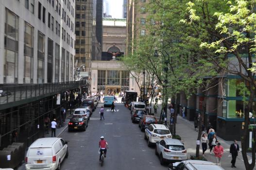 43rd Street facing Grand Central showing people, cyclists and cars using the right of way